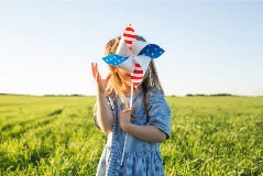 Young girl with patriotic pinwheel.