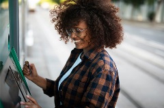 Woman using ATM