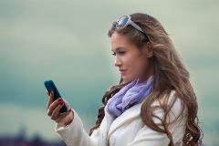 Woman looking at cell phone