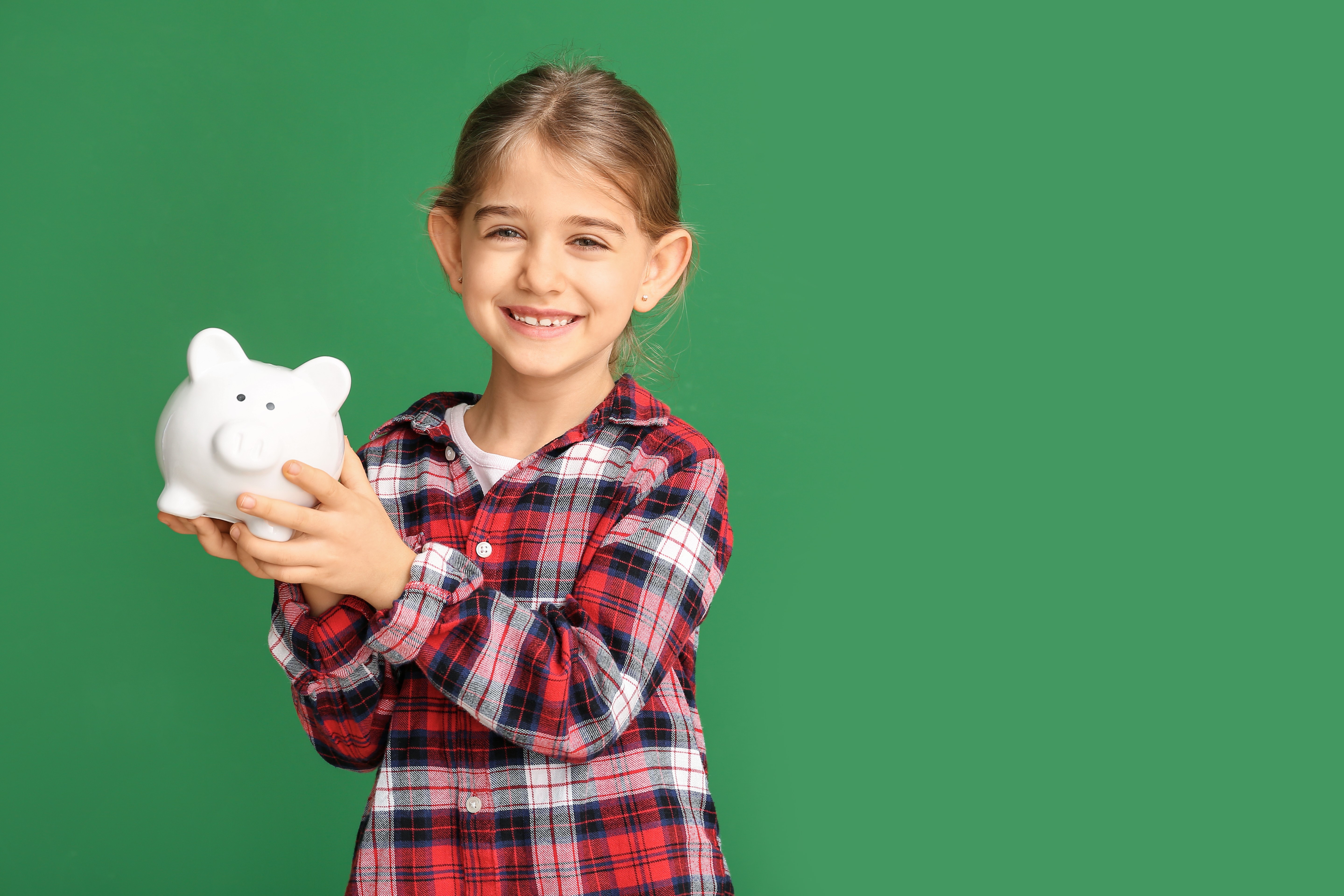 Girl with Piggy Bank