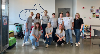 Group of CoreFirst volunteers at the local Humane Society
