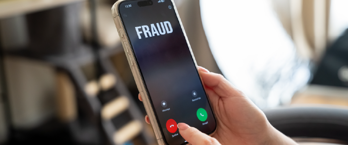 Woman declining a fraudulent call on her cell phone.