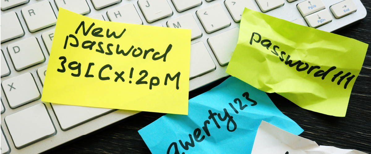 Sticky notes with passwords on a keyboard