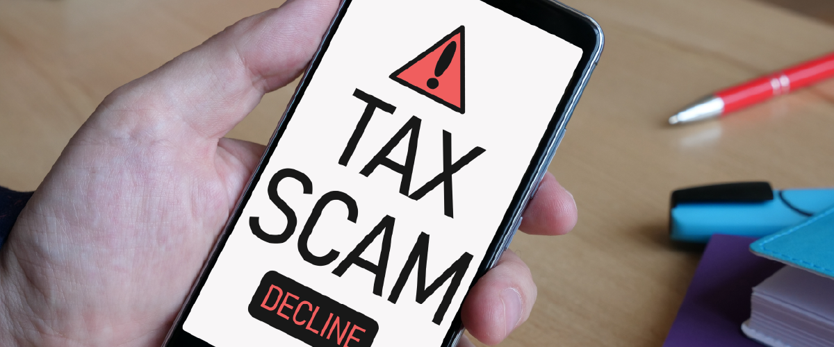 Cell phone with the words "Tax Scam" on the screen, with the opportunity to decline the call.