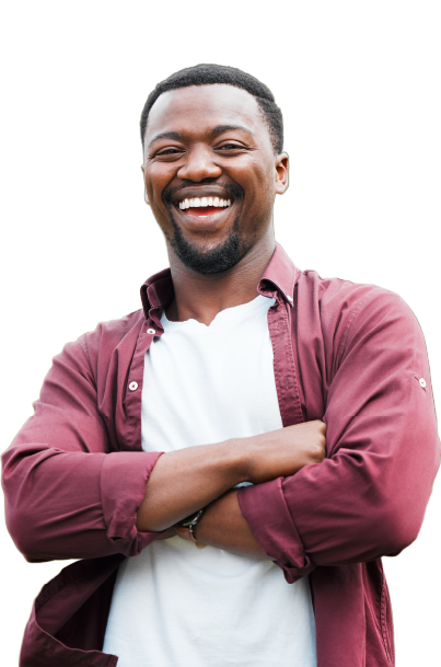 Man smiling and crossing his arms.