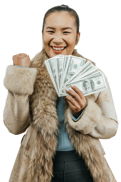 Excited woman holding a fan of one hundred dollar bills