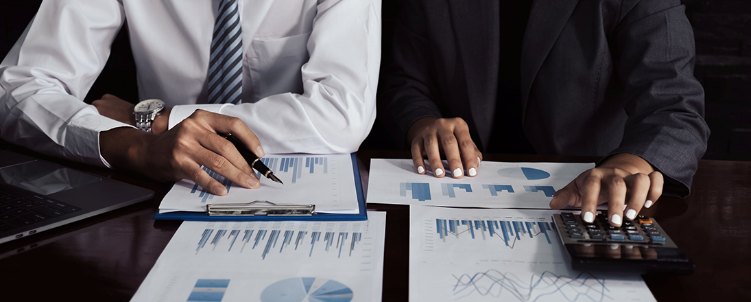 Business team reviewing graphs