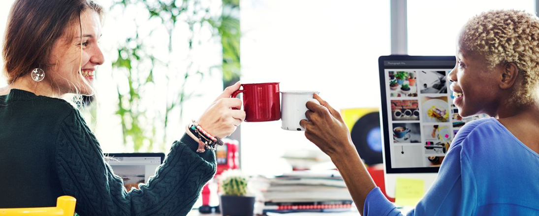 Two women having a business meeting with coffee