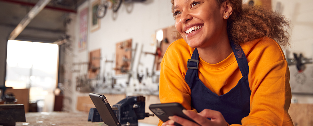 Young business woman on mobile phone