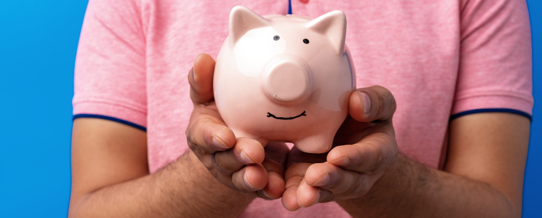 Man holding piggy bank